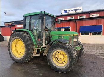 Farm tractor JOHN DEERE 6310